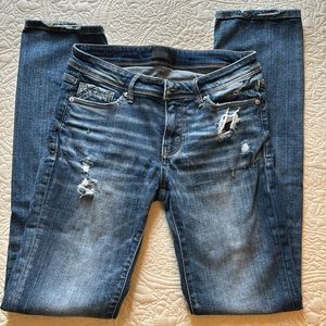 Women’s Buckle Black, straight leg jeans.